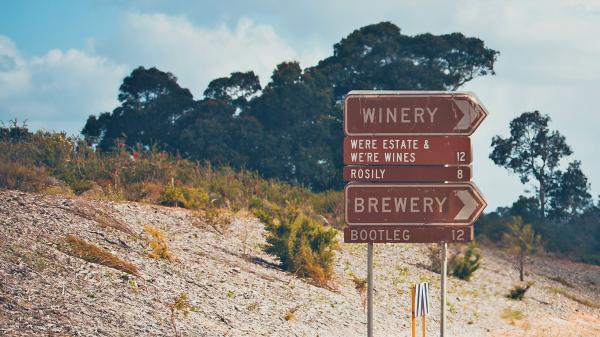 content destination road sign brewery winery right